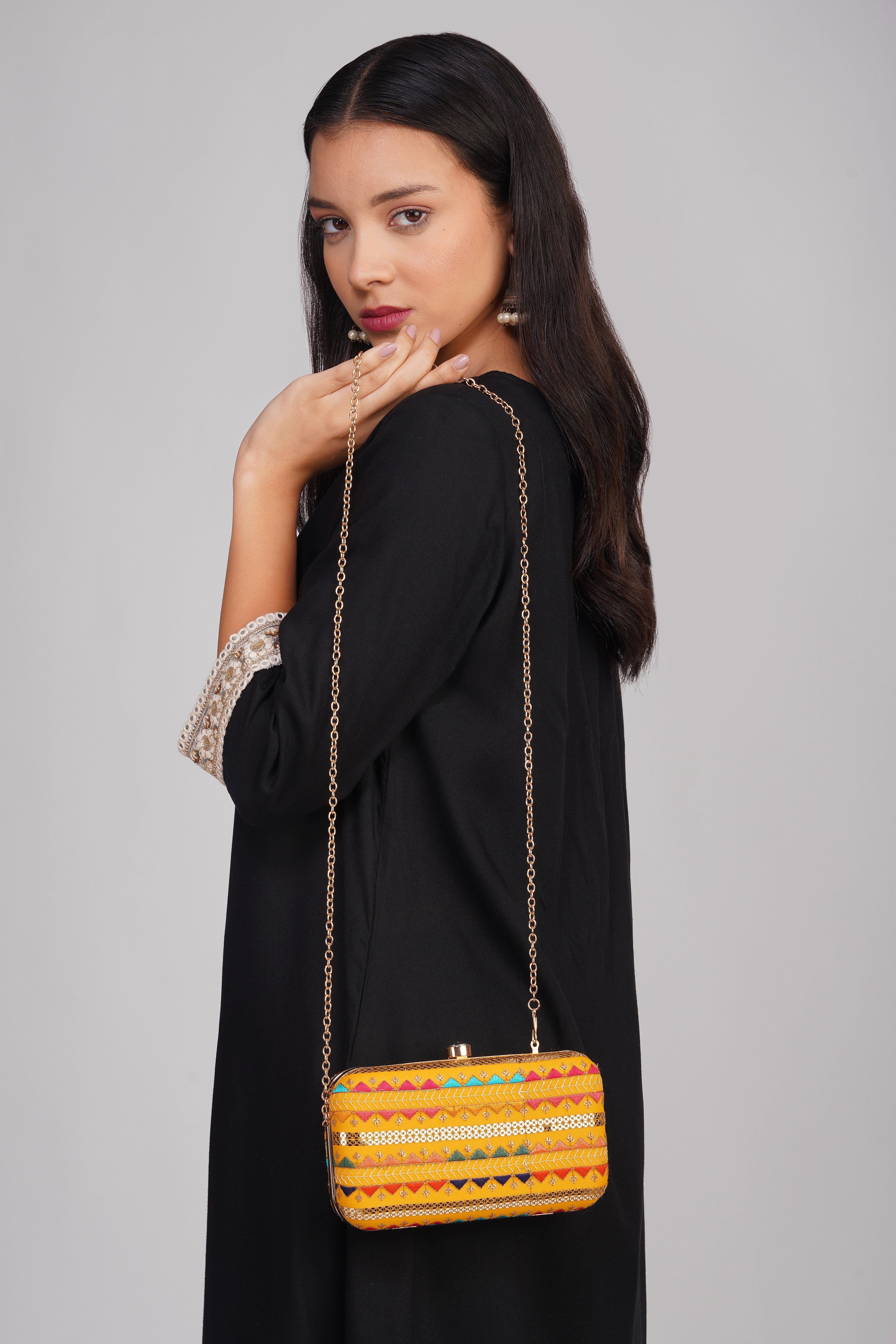 Nice-G Vivid Yellow Clutch Bags: A Touch of Elegance