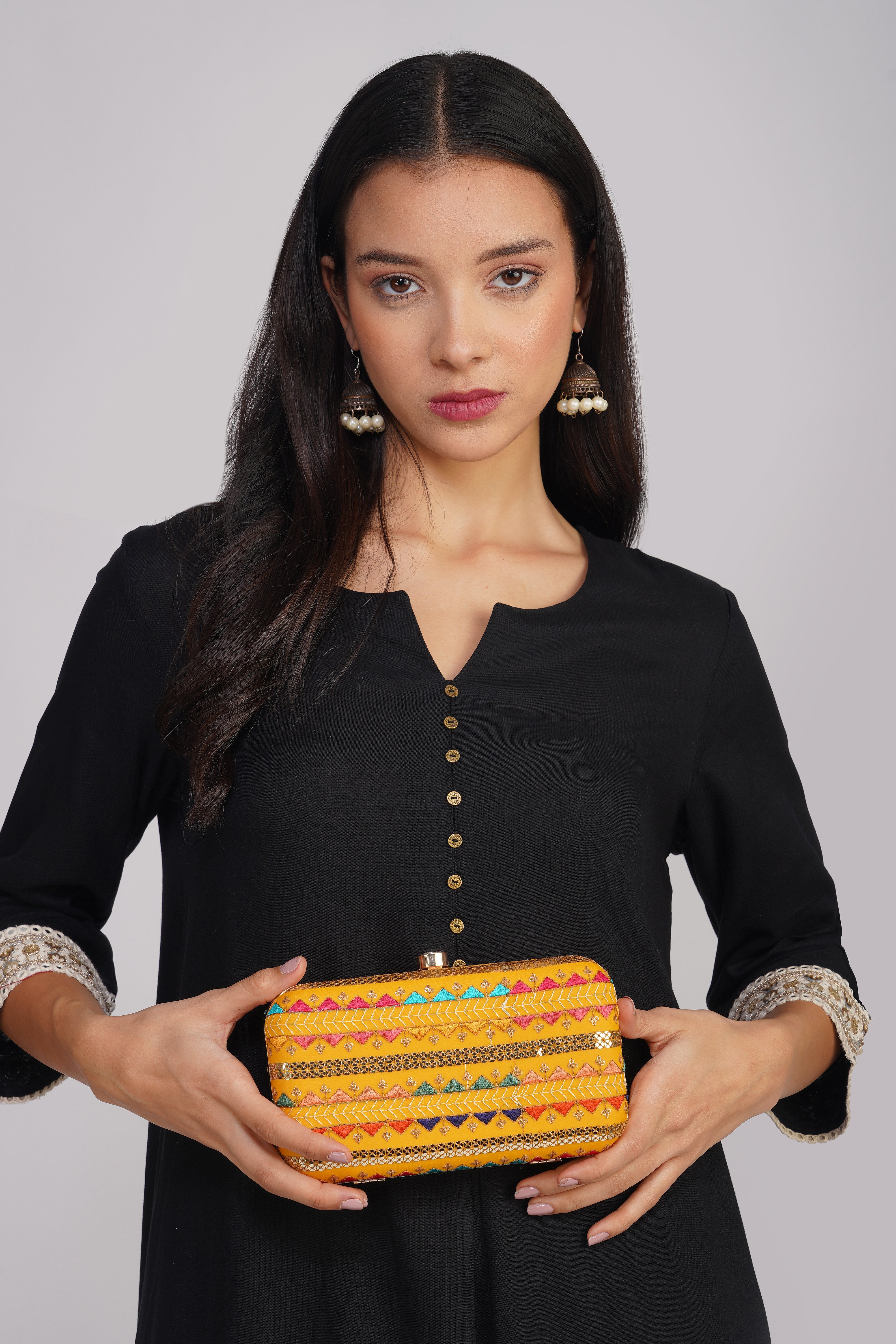 Nice-G Vivid Yellow Clutch Bags: A Touch of Elegance